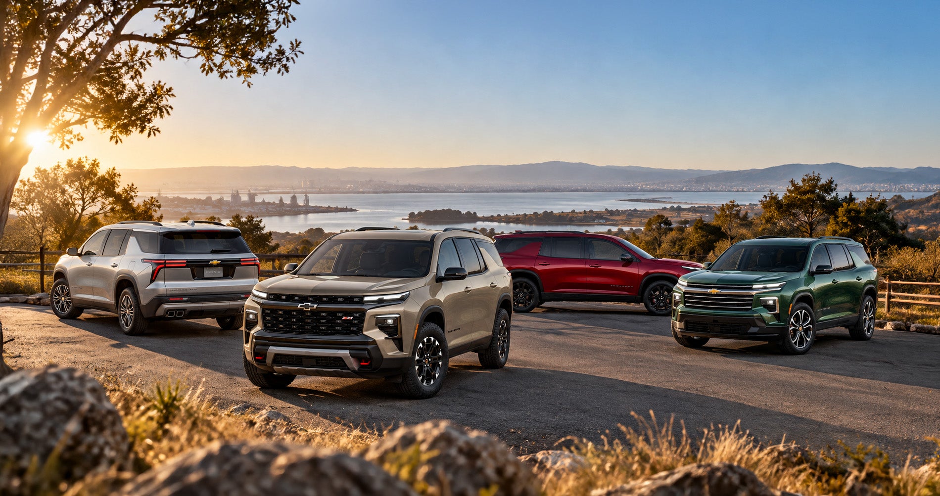 2027 Chevrolet Traverse trim levels displayed together at a scenic overlook in Pittsburg, CA