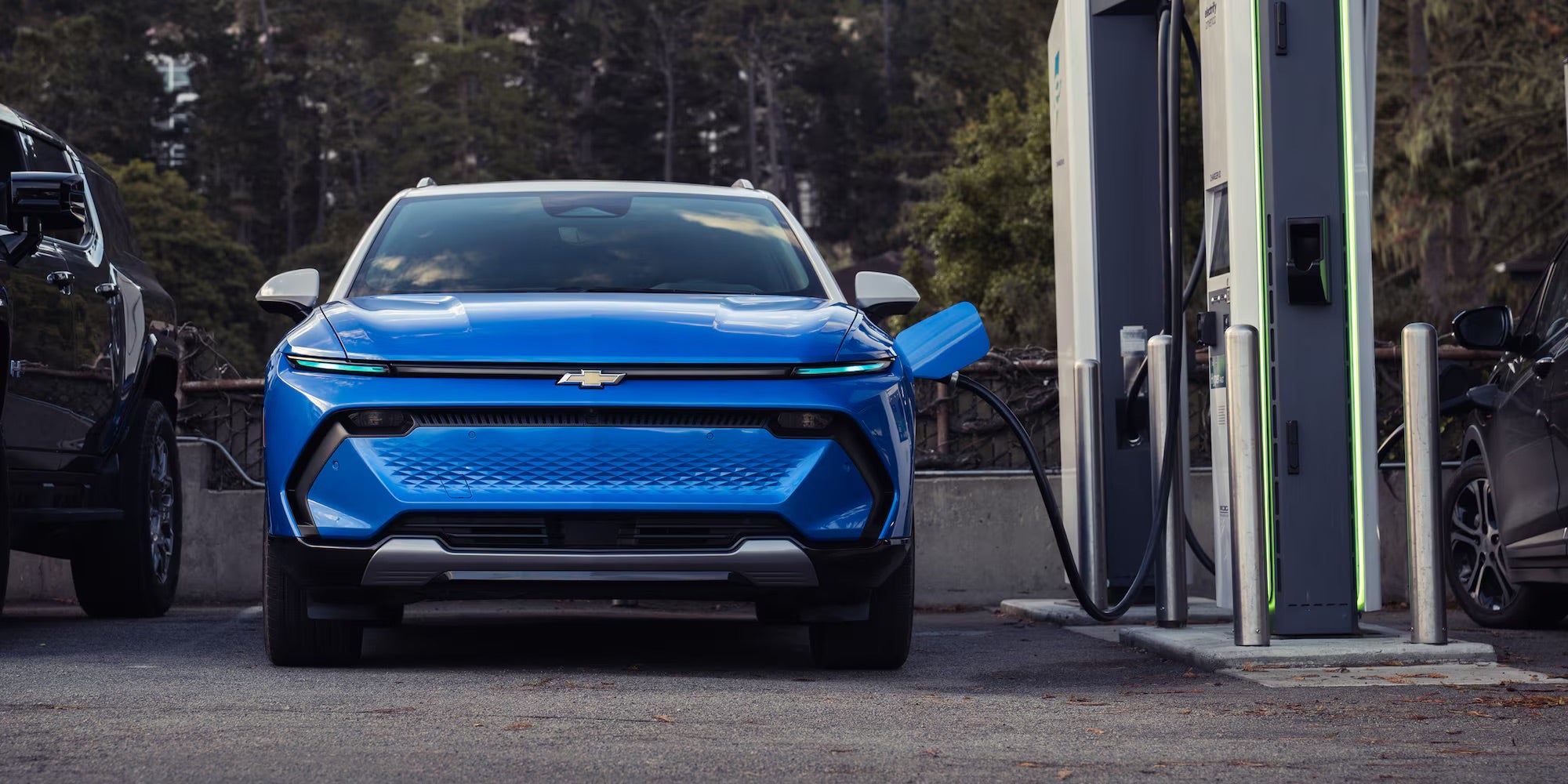 Chevy Equinox EV charging at an outdoor charging station